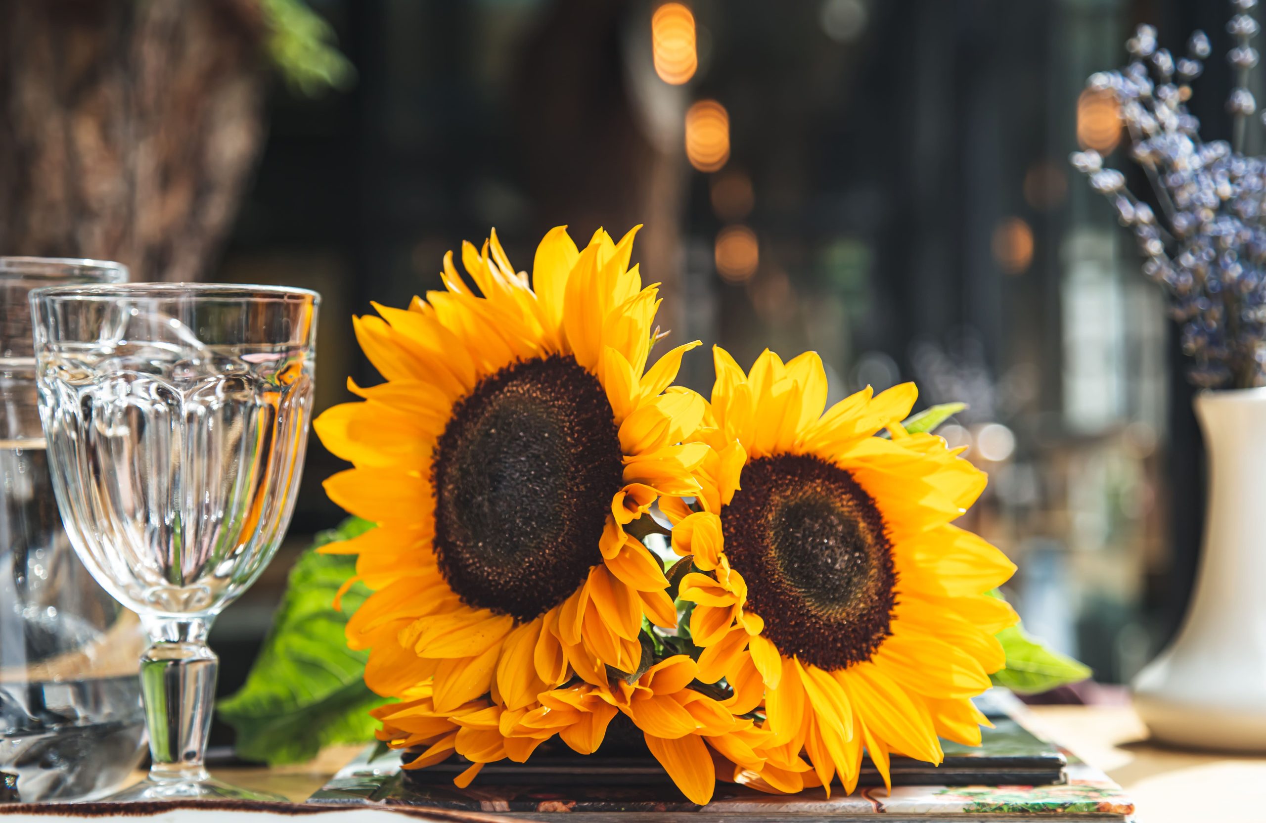 wholesale artificial sunflowers bulk display in hotel lobby – lifelike yellow blooms for event decoration