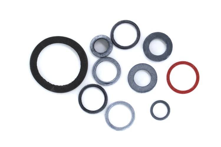 Assorted molded rubber rings and grommet-style components