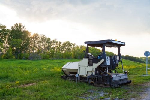 Outdoor machinery with protected cable routing