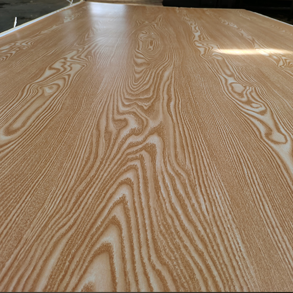 Fancy Board showcases a smooth laminated surface with natural wood grain patterns in warm tones.