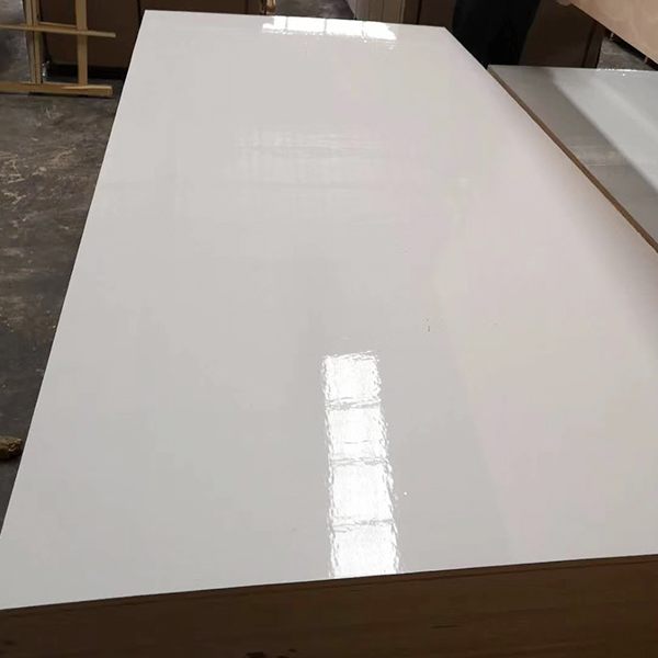 A smooth white HPL Fireproof Board with a glossy surface and clean edges ready for installation.